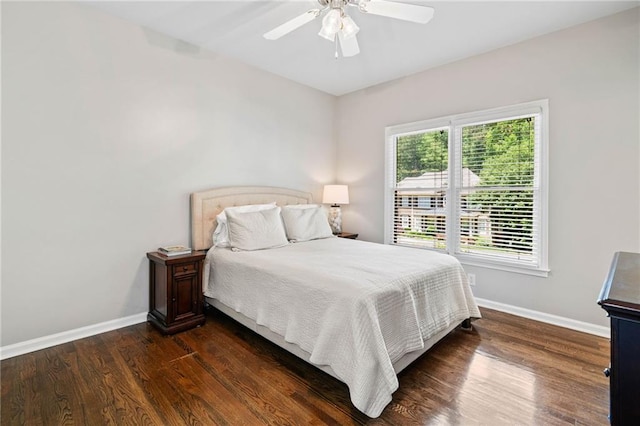 997 Thousand Oaks Bnd NW, Kennesaw, GA 30152 - bedroom featuring baseboards, dark wood-type flooring, and ceiling fan