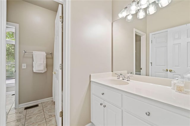 997 Thousand Oaks Bnd NW, Kennesaw, GA 30152 - bathroom featuring marble look tile flooring, baseboards, and vanity