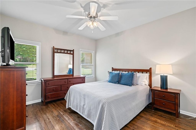 997 Thousand Oaks Bnd NW, Kennesaw, GA 30152 - bedroom featuring wood finished floors, multiple windows, and baseboards