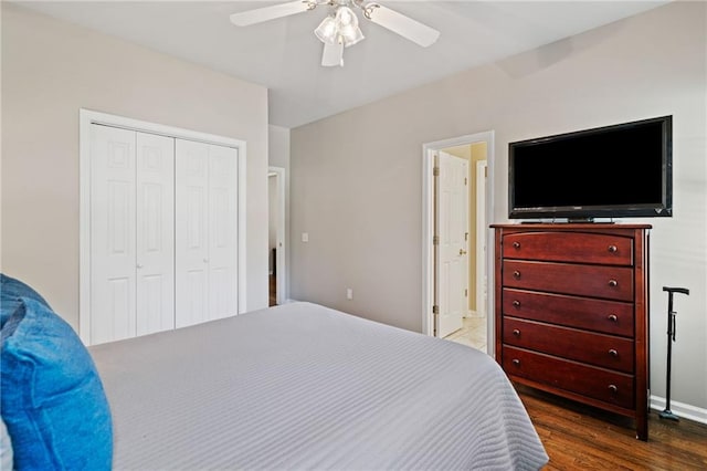997 Thousand Oaks Bnd NW, Kennesaw, GA 30152 - bedroom featuring a closet, wood finished floors, a ceiling fan, and ensuite bath