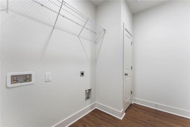 laundry area featuring dark wood-type flooring, hookup for an electric dryer, and hookup for a washing machine