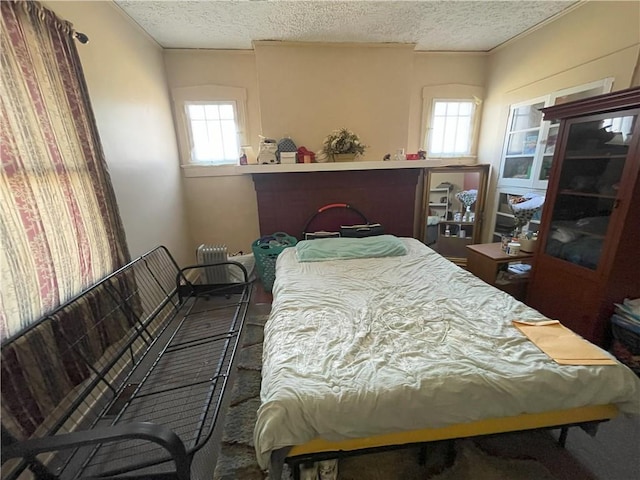 bedroom featuring a textured ceiling