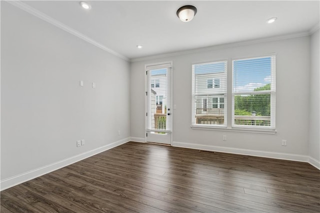 2631 Creekside Dr NW, Atlanta, GA 30318 - empty room with crown molding, baseboards, dark wood-style flooring, and recessed lighting