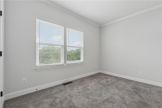 2631 Creekside Dr NW, Atlanta, GA 30318 - carpeted empty room featuring crown molding and baseboards