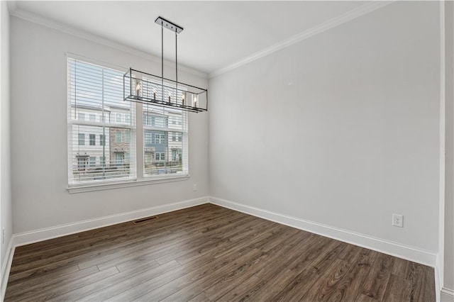 2631 Creekside Dr NW, Atlanta, GA 30318 - unfurnished dining area featuring healthy amount of natural light, dark wood-style flooring, a chandelier, crown molding, and baseboards