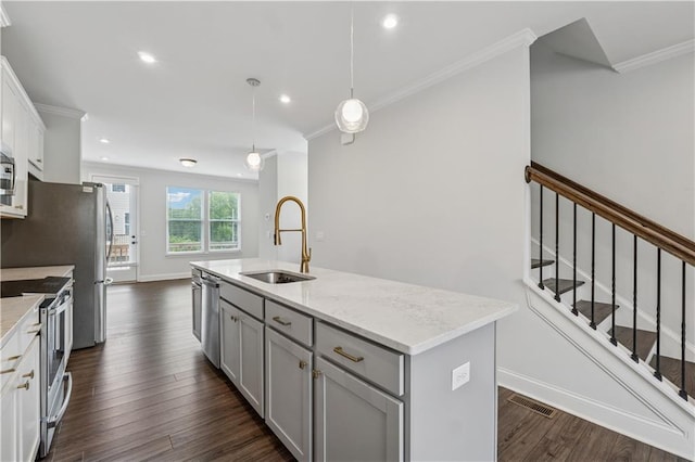 2631 Creekside Dr NW, Atlanta, GA 30318 - kitchen featuring appliances with stainless steel finishes, a sink, gray cabinets, ornamental molding, and dark wood-style flooring
