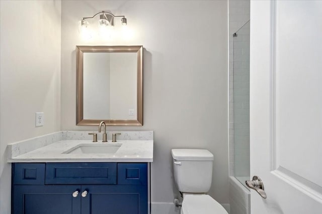 full bathroom featuring shower / bathing tub combination, vanity, and toilet