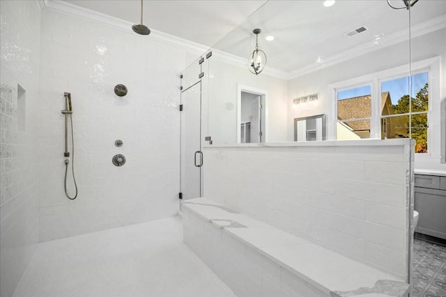 full bath featuring ornamental molding, a stall shower, vanity, and visible vents