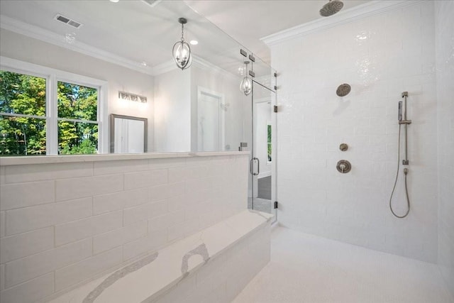 bathroom with ornamental molding, a stall shower, and visible vents