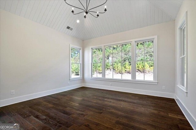 spacious closet featuring dark hardwood / wood-style flooring