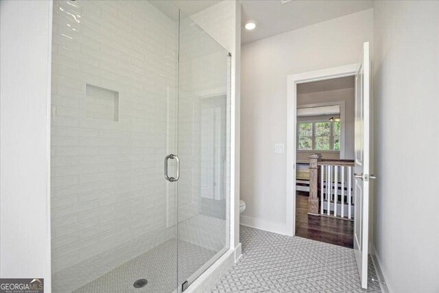 interior space with a notable chandelier and dark hardwood / wood-style flooring