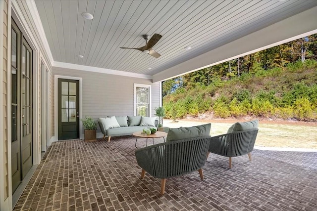 view of patio with ceiling fan and an outdoor hangout area