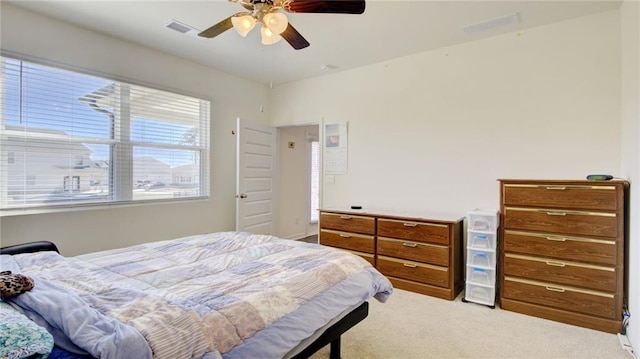 bedroom featuring ceiling fan and carpet floors