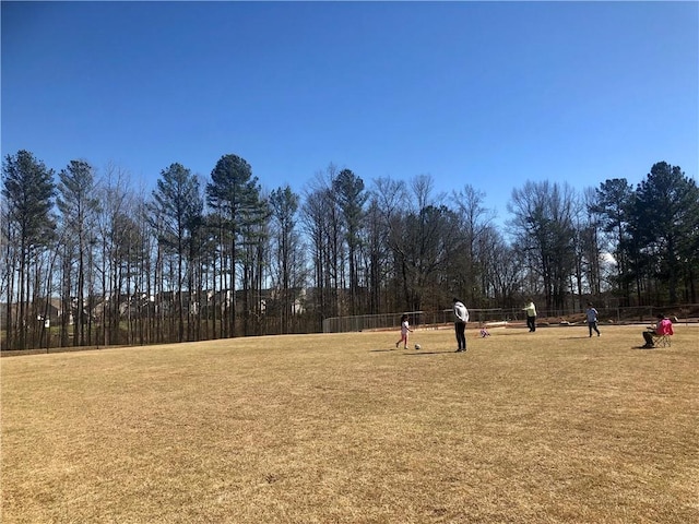 view of home's community featuring a lawn