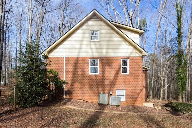 view of home's exterior featuring cooling unit