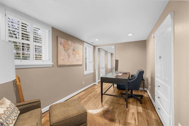 office area with recessed lighting, baseboards, and wood finished floors