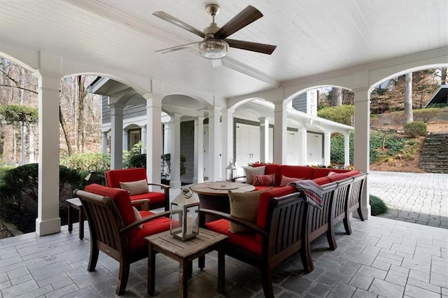 view of patio / terrace featuring an outdoor living space and ceiling fan
