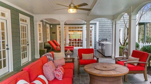 view of patio / terrace featuring outdoor lounge area, a ceiling fan, and french doors