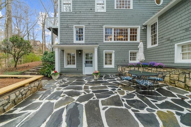 back of house featuring a patio