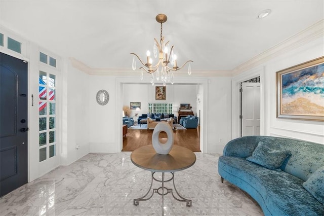interior space featuring a notable chandelier, marble finish floor, baseboards, and ornamental molding