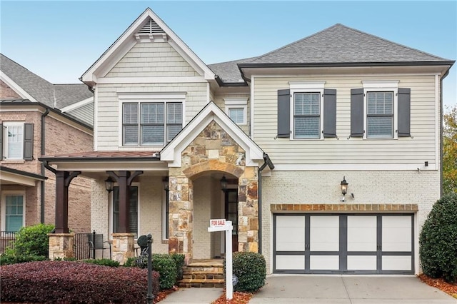 view of front of home featuring a garage