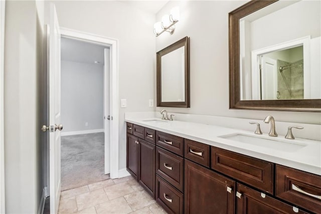 bathroom featuring tile patterned floors and vanity