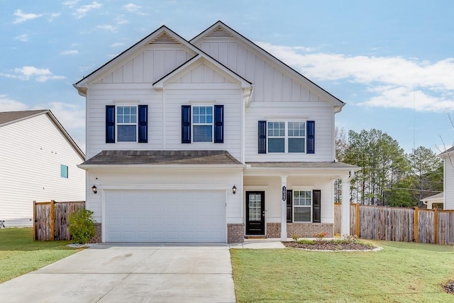 view of front facade featuring a garage and a front lawn