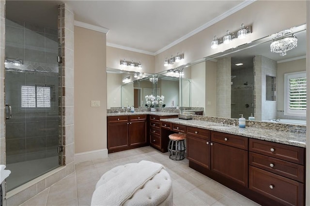 full bath with tile patterned flooring, a shower stall, crown molding, baseboards, and vanity