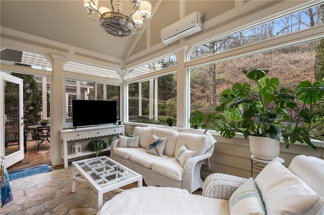 sunroom / solarium featuring a notable chandelier, vaulted ceiling, and a wall unit AC