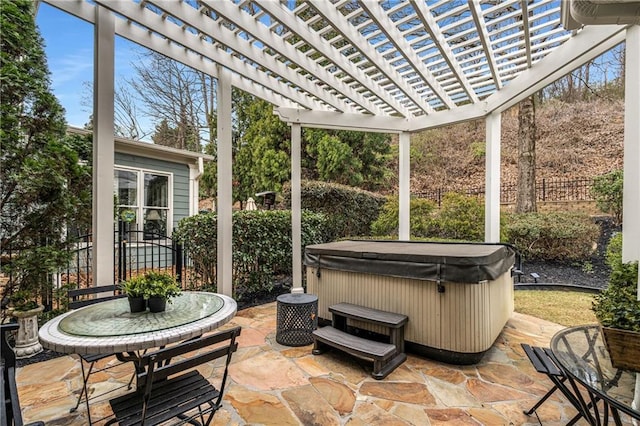 view of patio / terrace with outdoor dining area, fence, a pergola, and a hot tub