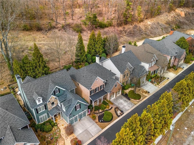 birds eye view of property with a residential view