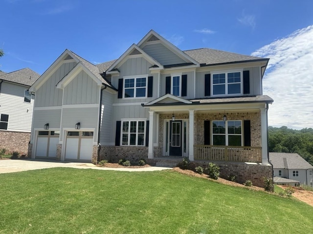 3799 Cheyenne Ln, Jefferson, GA 30549 - craftsman inspired home with board and batten siding, covered porch, a front yard, and a garage