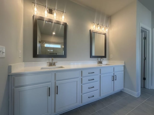 3799 Cheyenne Ln, Jefferson, GA 30549 - full bathroom featuring tile patterned floors, double vanity, a tile shower, and baseboards