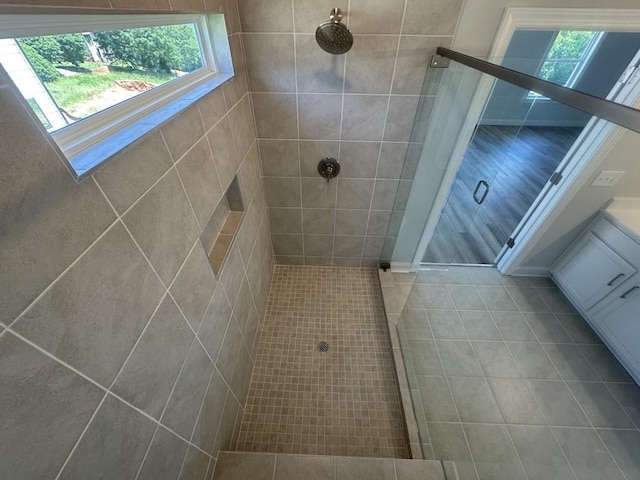 3799 Cheyenne Ln, Jefferson, GA 30549 - full bathroom with healthy amount of natural light, a stall shower, and tile patterned floors