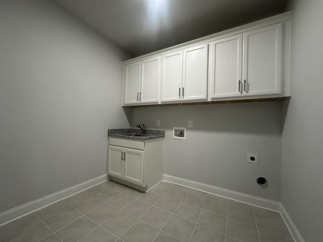 3799 Cheyenne Ln, Jefferson, GA 30549 - laundry area featuring electric dryer hookup, hookup for a washing machine, cabinet space, baseboards, and light tile patterned floors