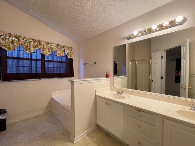 bathroom with lofted ceiling, vanity, a textured ceiling, and shower with separate bathtub