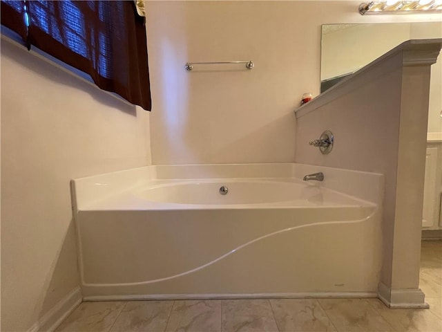 bathroom featuring a washtub