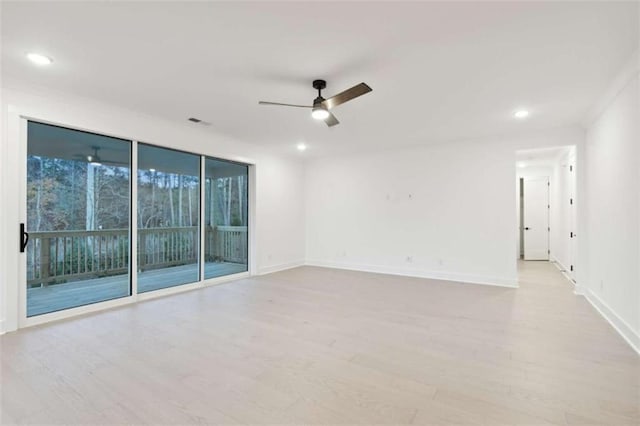 empty room with light wood finished floors, ceiling fan, baseboards, and recessed lighting