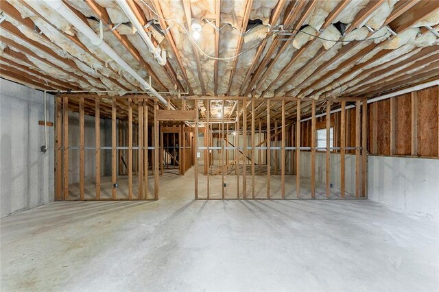 51 Legend Creek Way, Douglasville, GA 30134 - living area featuring carpet floors, visible vents, baseboards, high vaulted ceiling, and a ceiling fan