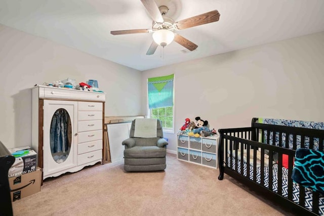 14 Oak Leaf Way, Hamilton, GA 31811 - bedroom with light colored carpet, a nursery area, and ceiling fan