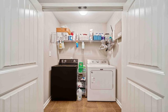 14 Oak Leaf Way, Hamilton, GA 31811 - laundry area featuring separate washer and dryer and light tile patterned floors