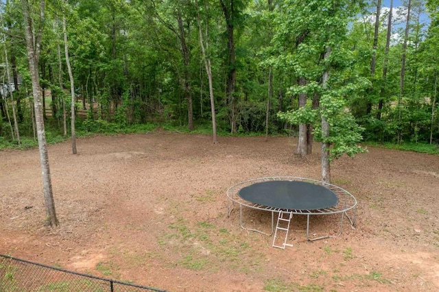 14 Oak Leaf Way, Hamilton, GA 31811 - view of yard featuring a trampoline