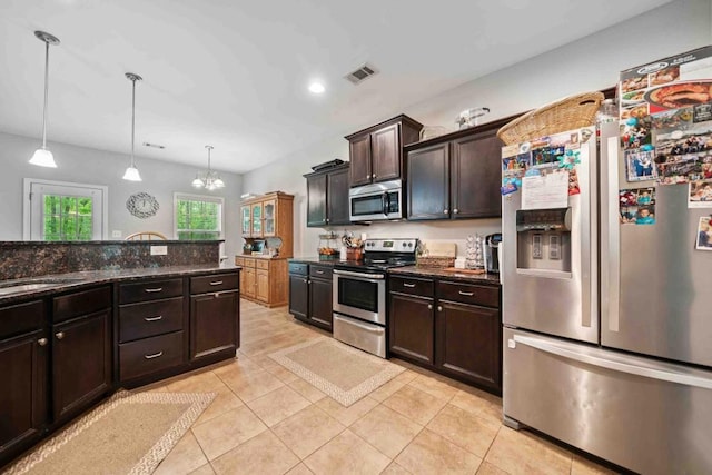 14 Oak Leaf Way, Hamilton, GA 31811 - kitchen featuring appliances with stainless steel finishes, light tile patterned flooring, dark brown cabinetry, recessed lighting, and decorative light fixtures