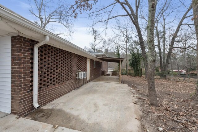 view of side of property featuring cooling unit