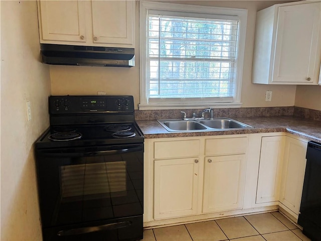 kitchen with dark countertops, a sink, under cabinet range hood, and black appliances