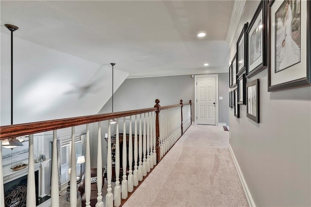 hallway with recessed lighting, light carpet, baseboards, and lofted ceiling