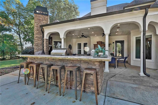 view of patio featuring a grill