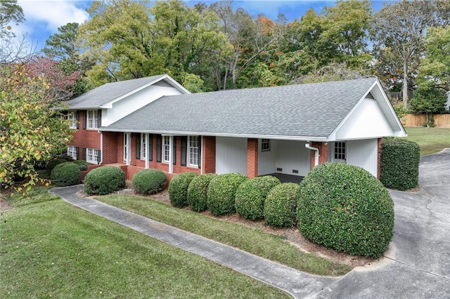 view of front of property with a front lawn