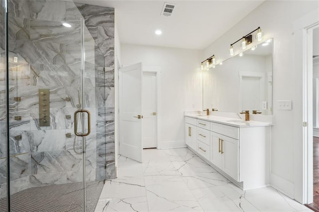 bathroom with vanity and walk in shower