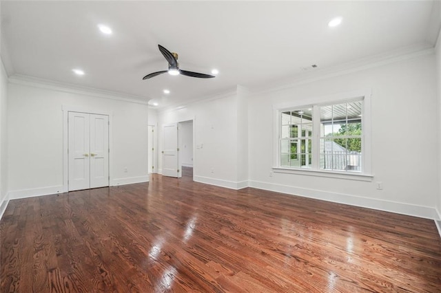 unfurnished bedroom featuring wood-type flooring, ornamental molding, and ceiling fan